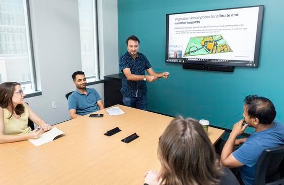 Professor Luis Ortiz with his Micrometeorological Modeling class. Photo by Ron Aira/Office of University Branding