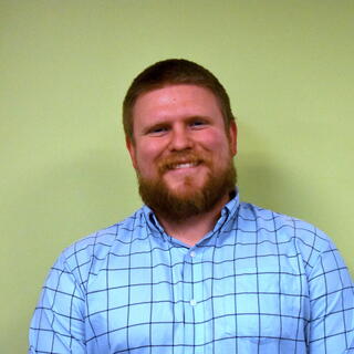 PhD Graduate Zachary Messegee