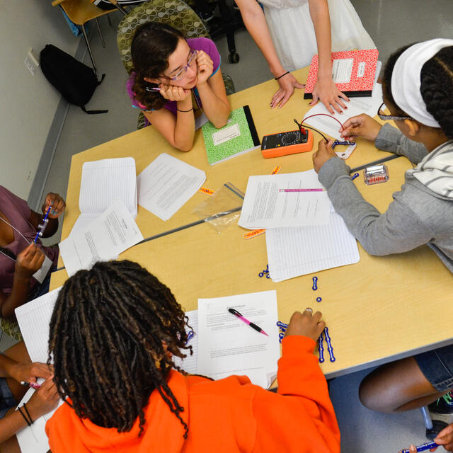 Students sitting at table