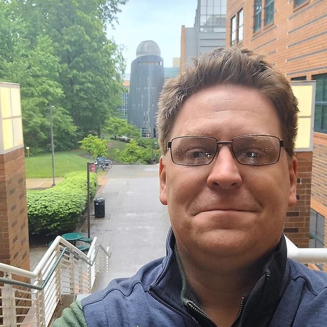 Dr Rob Parks in front of Mason Observatories