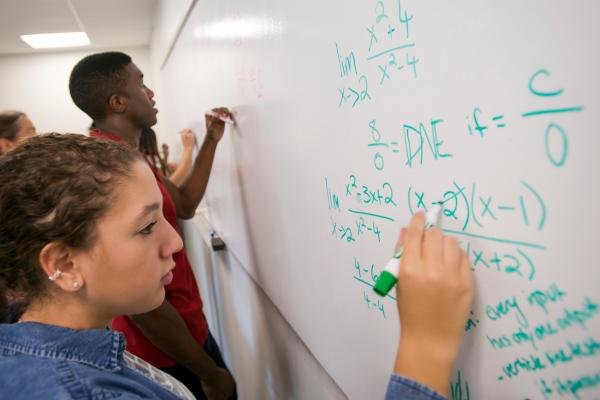 Student solving math problems