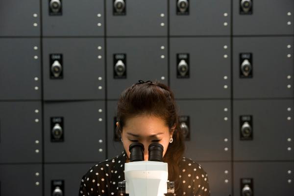 Undergraduate Biology student working in the lab