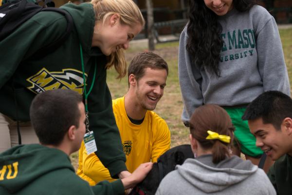 Mason Ambassadors painting student club and organization cubes