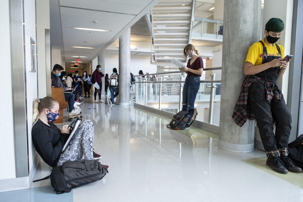 Students with mask in explor. hall