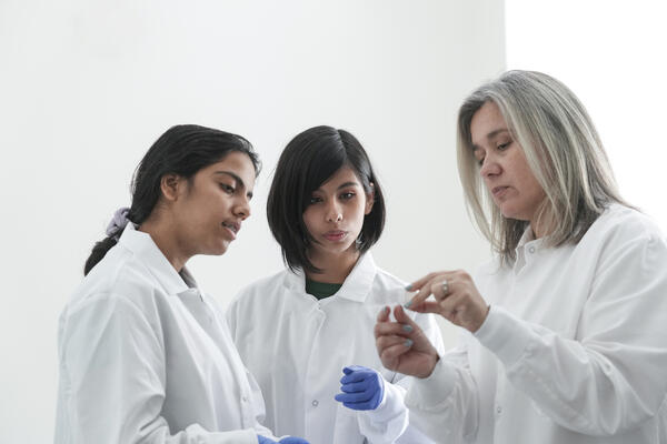 Image of women scientists in lab coats