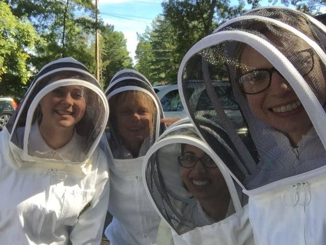 Environmental Science majors hooded up and excited to study bees up close.