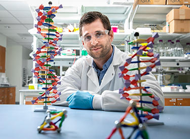 Mason Engineering's Remi Veneziano is using DNA nanotechnology to lay the foundation for developing vaccines that could block infection. His team conducts research at the Laboratory for Bio-Inspired Nanoarchitectures on the Science and Technology Campus in Prince William County. The lab is part of the Institute for Biohealth Innovation.