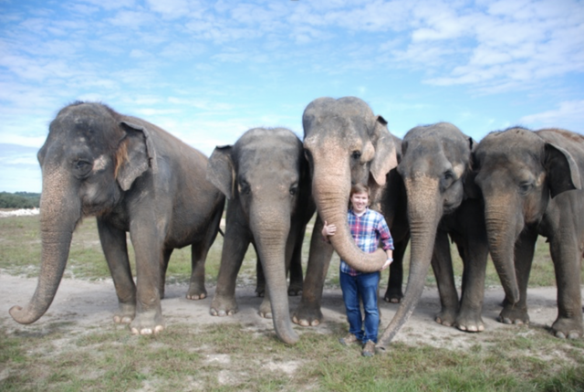 ESP PhD student Chase LaDue with a male Asian Elephant