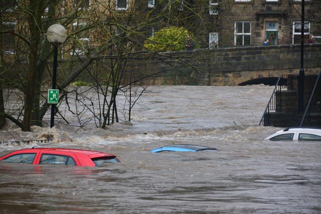 Image of cars submerged after flooding