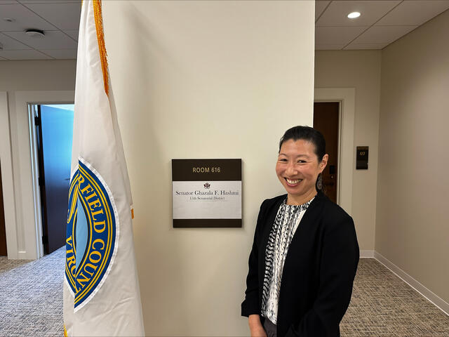 Laura Akesson smiles in the offices of Senator Hashmi. Photo provided. 