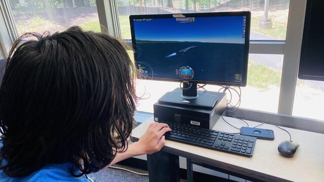 A camper's virtual spaceplane successfully takes off.