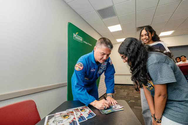 Astronaut Kjell Lindgren signing autographs at Space Day 2024