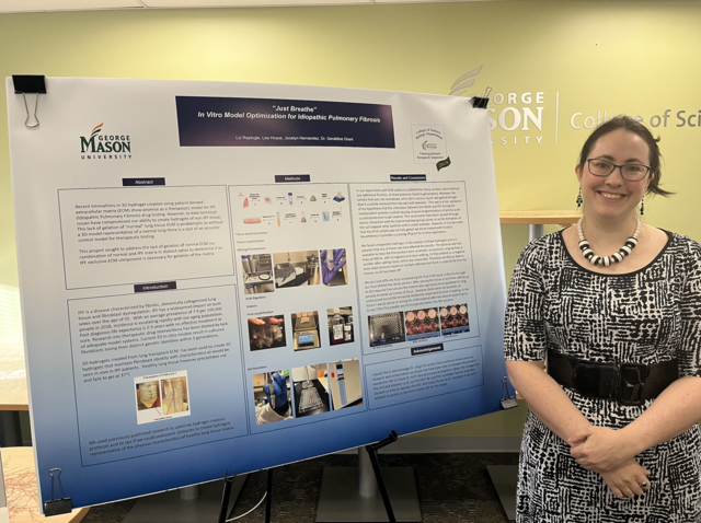 Liz Replogle stands with her research poster. She presented research she conducted with Professor Grant on idiopathic pulmonary fibrosis (IPF), a severe lung disease that causes scarring and thickening of lung tissue. 