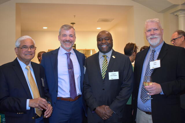 Dean Cody Edwards stands with Professor Jagadish Shukla, George Mason President Gregory Washington, and AOES Chair Mark Uhen.