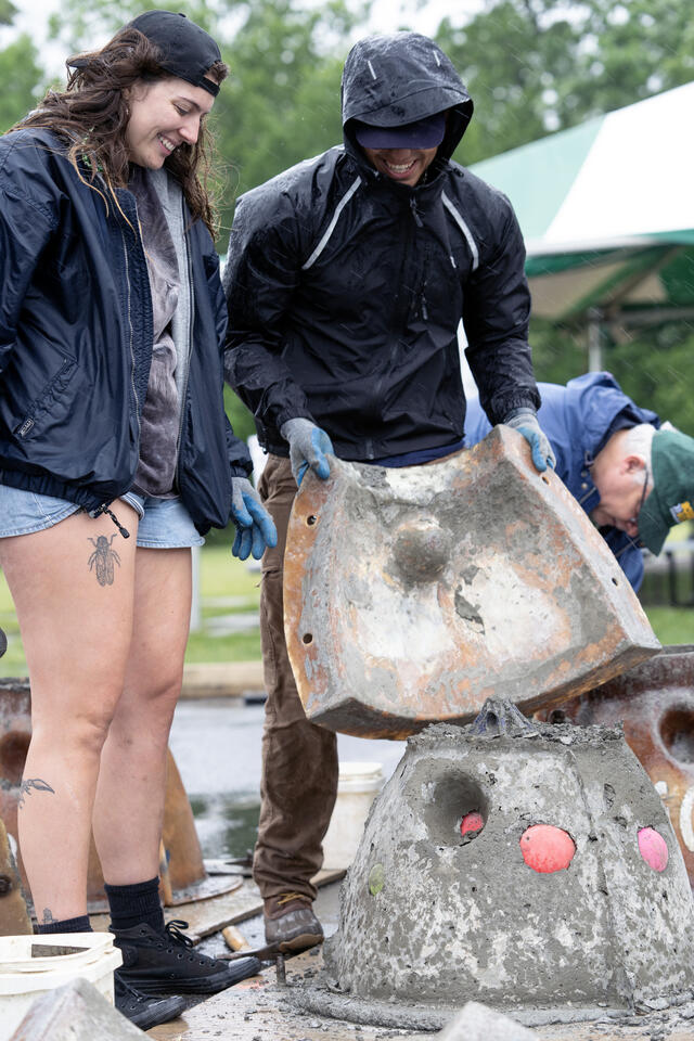 Students build an artificial reef with Jesse Howe, assistant director of Coastal Conservation Association Maryland, on the Science and Technology Campus. Photo by Evan Cantwell/George Mason University