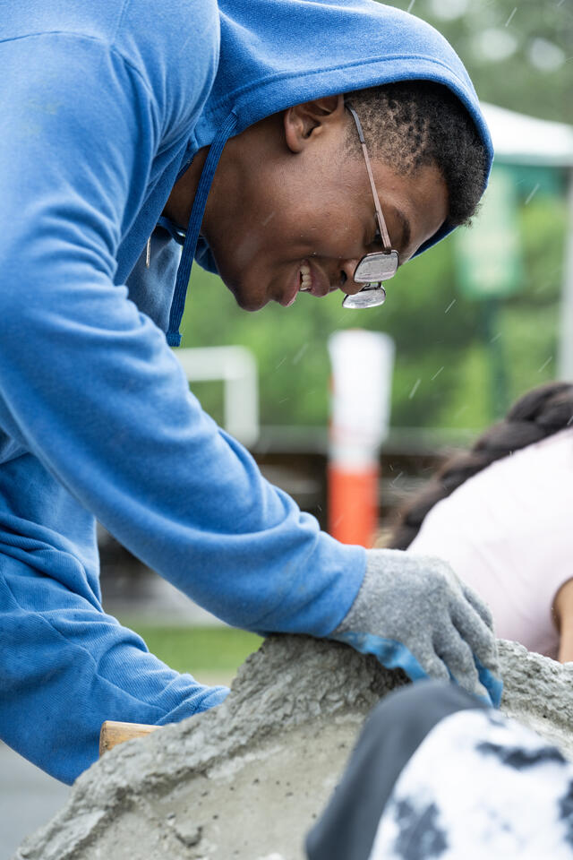 Students build an artificial reef with Jesse Howe, assistant director of Coastal Conservation Association Maryland, on the Science and Technology Campus. Photo by Evan Cantwell/George Mason University