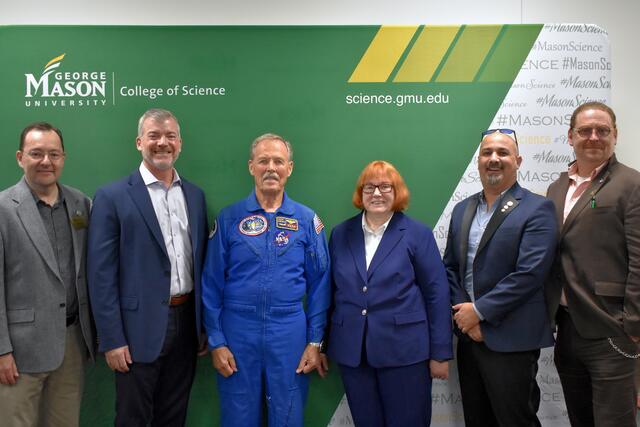Captain Hoot Gibson and Eliad Peretz with George Mason Dean Edwards and Space Day event coordinators. 
