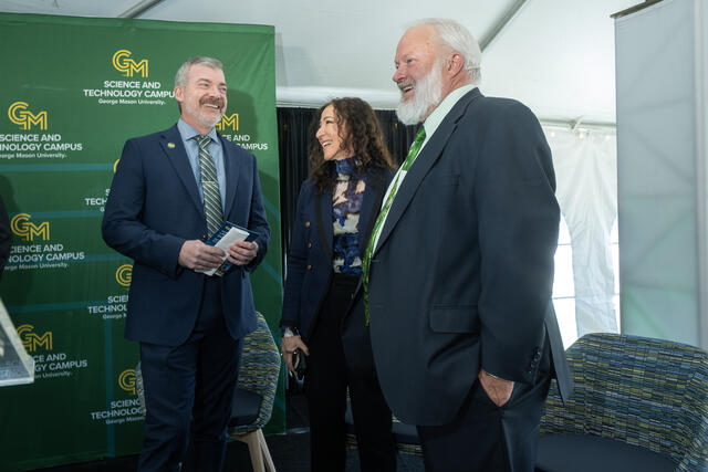 Cody Edwards (pictured left to right), interim dean, College of Science; Ingrid Guerra-López, dean, College of Education and Human Development; and Ken Ball, dean, College of Engineering and Computing; on stage at the Life Sciences and Engineering Building grand opening on the Science and Technology Campus. Photo by Evan Cantwell/Office of University Branding