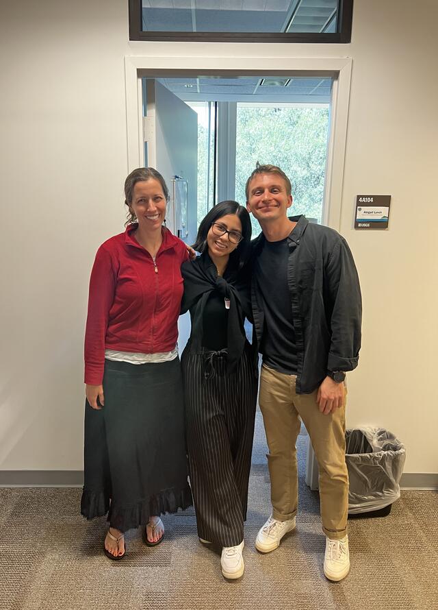 Camacho (center) with her mentors Abby Lynch (left) and Jackson Valler (right) at the Reston offices. 