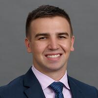 John W. Coggsdale IV, Assistant Director of Development