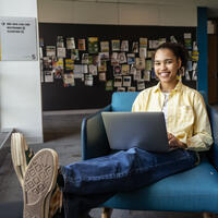 Student on laptop in Horizon Hall