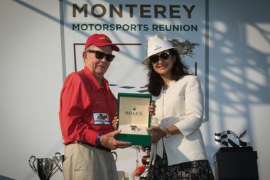 L-R: Lee Talbot, winner of the 2017 “Spirit of Monterey” Rolex Award of Excellence and Mounia Mechbal, Rolex Watch USA (photo courtesy: © ROLEX/Stephan Cooper)