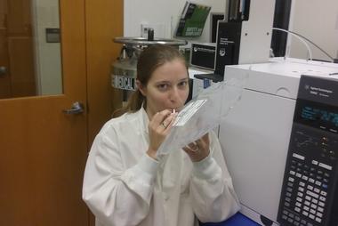 Researcher Allyson Dailey demonstrating how breath samples are collected. 