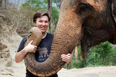 ESP PhD student Chase LaDue with a male Asian Elephant