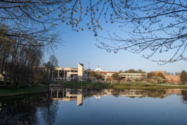 Image of campus from Mason pond. 