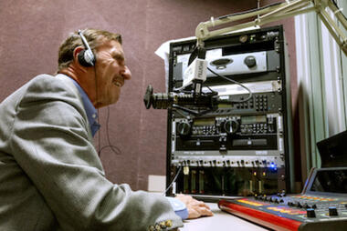 Robinson Professor Jim Trefil in the recording studio