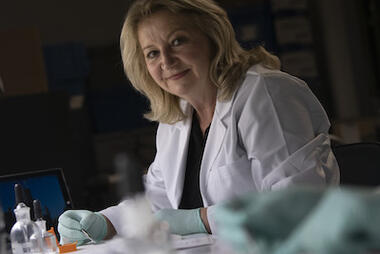 Carla Dove in her lab. Photo courtesy of the Smithsonian Institution