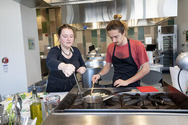 Students cooking in the lab