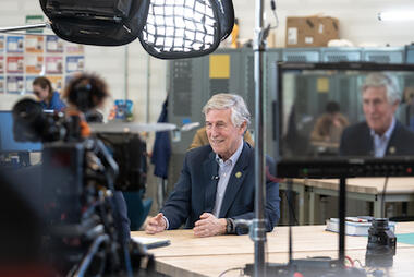 Rep. Don Beyer talks with ABC film crew at The MIX. Photo by Evan Cantwell/Creative Services