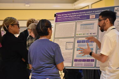 Student presenting their research at the 2024 Undergraduate Research Colloquium
