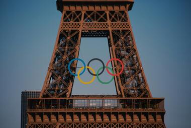 Olympic rings on the Eiffel Tower. Photo by Bo Zhang on Unsplash.