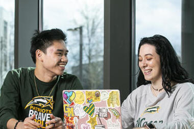 Two students in a tutoring session